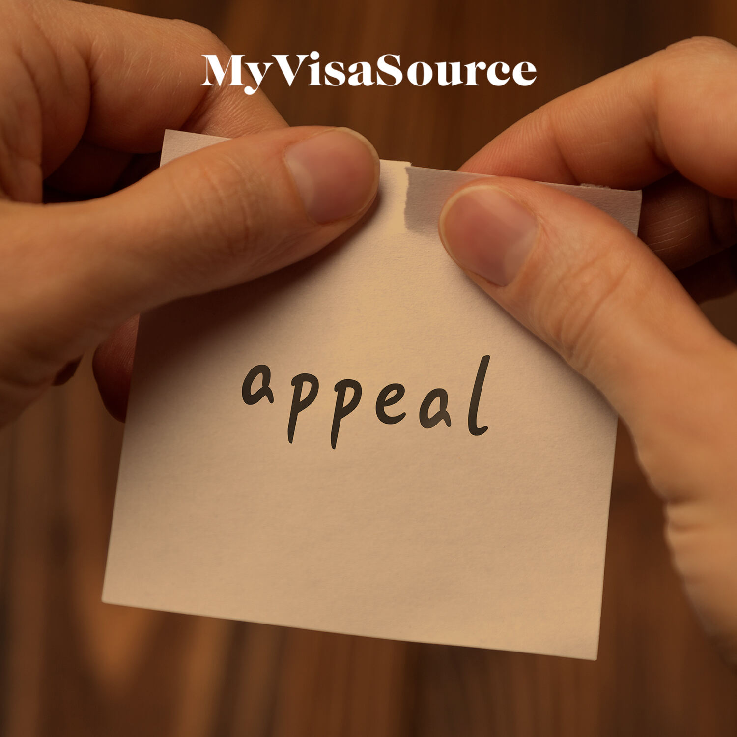 hands tearing paper with appeal written my visa source